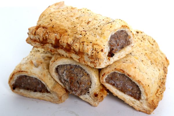 sausage rolls on white background
