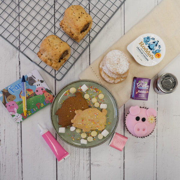 Little Piglet's Afternoon Tea Box spread out across a table